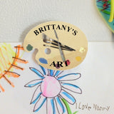 Refrigerator Magnet Palette shape with Wood Palette with brushes and a palette knife and some paint splotches  and personalized with any name