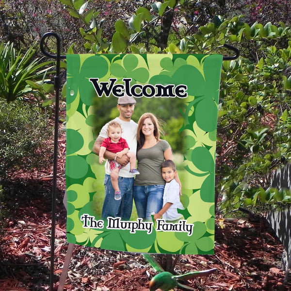 Any photo surrounded by a spray of shamrocks on a welcome garden flag marker