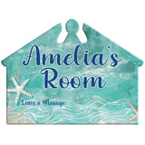 A house-shaped decorative wall sign with a turquoise and white ocean-themed design, featuring the text 'Any Name's Room' and 'Leave a Message,' plus a starfish and wave illustration, shown on a plain white background.