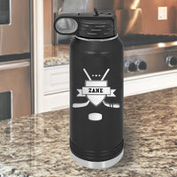 32 ounce water bottle black with hockey crossed sticks crest and puck name in ribbon of crest