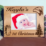 First Christmas Picture Frame for wide photos has santa hat, tree and santa with a scroll showing the year. You can use this frame for any Christmas, first, second, third etc