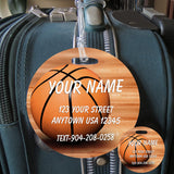 Round Bag Tag Basketball sitting on wood floor personalized with identification name and address