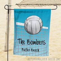 yard flag showing volleyball going over a net on a sky blue background personalized with any two lines of text