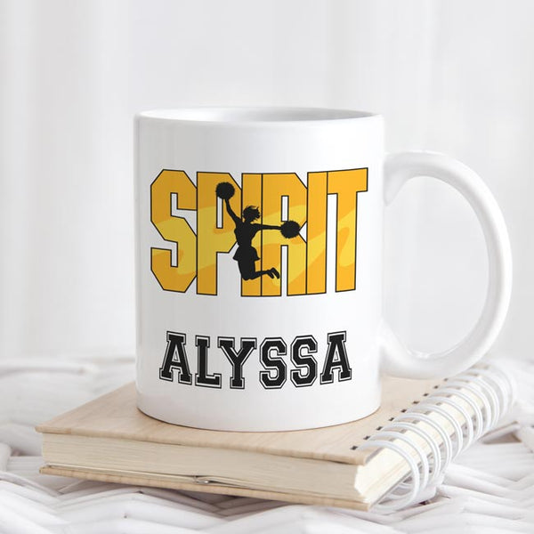 Cheerleader in the word spirit and personalized with any name on a ceramic coffee mug