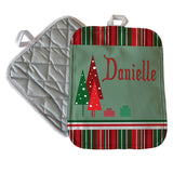 7" x 9" Christmas Pot Holders with Red, white and green christmas stripes on top and bottom, three triangle trees and two gift boxes along with your name.