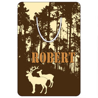 wilderness scene of trees, a buck and doe on a 2" x 3" bookmark