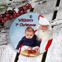 Round Porcelain Photo Ornament with picture of baby with Santa Claus. Custom Text for Name, Message and Year.