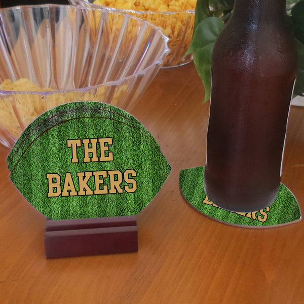 football shaped coasters, set of 4 personalized with any text. comes with wood base for disply.