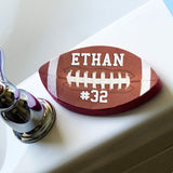 Football Shaped Sponge with Football image and personalized with any name and jersey number or custom text.