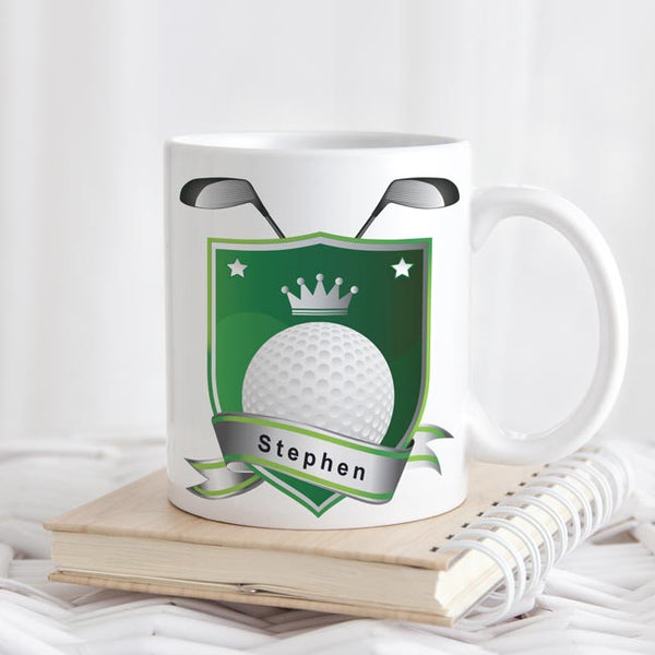 Golf crest with name within the ribbon on the bottom shown on an 11 ounce mug