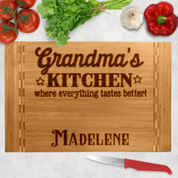 Personalized wood block cutting board with Grandma's (or any title) Kitchen where everything tastes better. Personalized with a name on the bottom