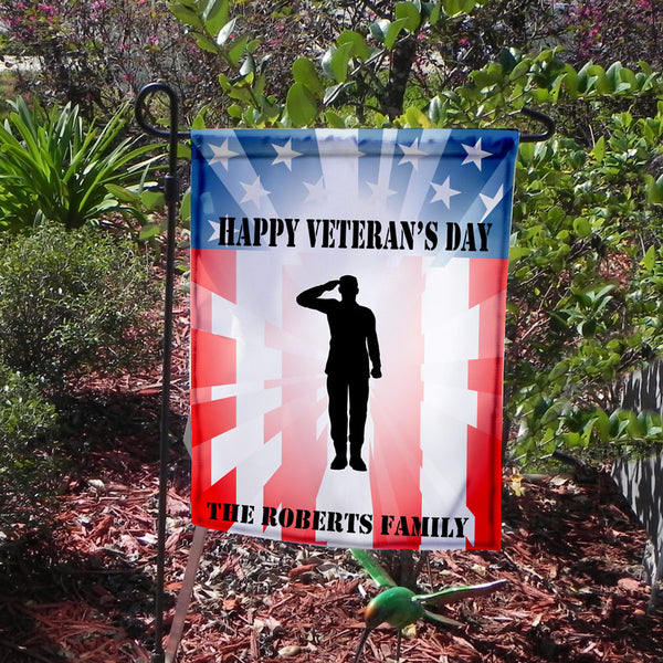 Soldier Saluting on a USA Flag with Veteran's Day Greetings and Family Name