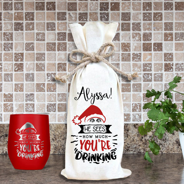Wine Bottle Bag Gag Gift Says He Sees how much you're drinking with santa claus head and your name