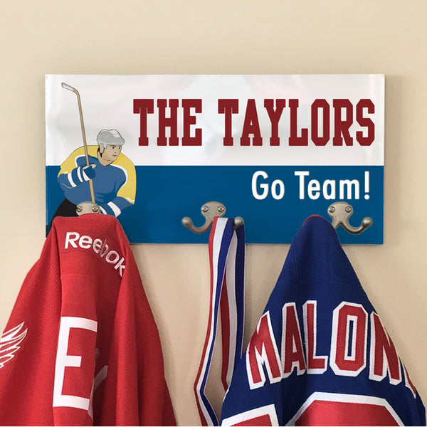 Coat Hanger with Hockey Them image and personalized with any two lines of text.  Coat Rack holds 6 garments
