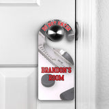 Hockey Theme Do Not Disturb Door Sign pictured hanging on door knob