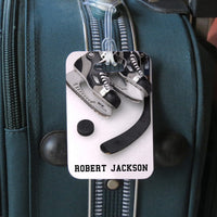 Hockey theme luggage tags with skates puck and stick on ice design and your personalized name.  Side 2 has contact info