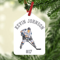 Gift Tag shape Christmas Ornament with Hockey Player in center and arched name on top. Jersey number or year on bottom