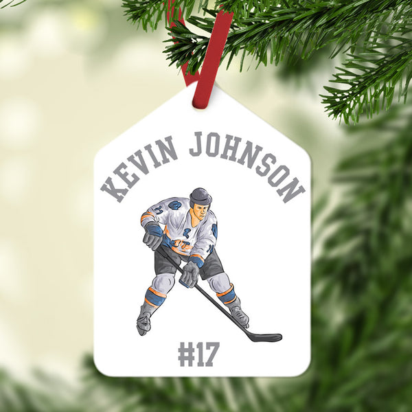 Gift Tag shape Christmas Ornament with Hockey Player in center and arched name on top. Jersey number or year on bottom