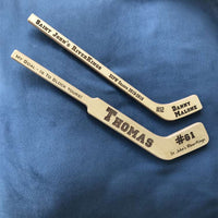 Personalized Wood Mini Hockey Sticks for players and goalies. Personalized with 4 areas of text.