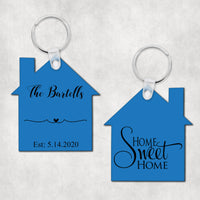House shaped key ring with Home Sweet Home in fancy font on 1 side and any personalization on the other. Your font choice and color scheme