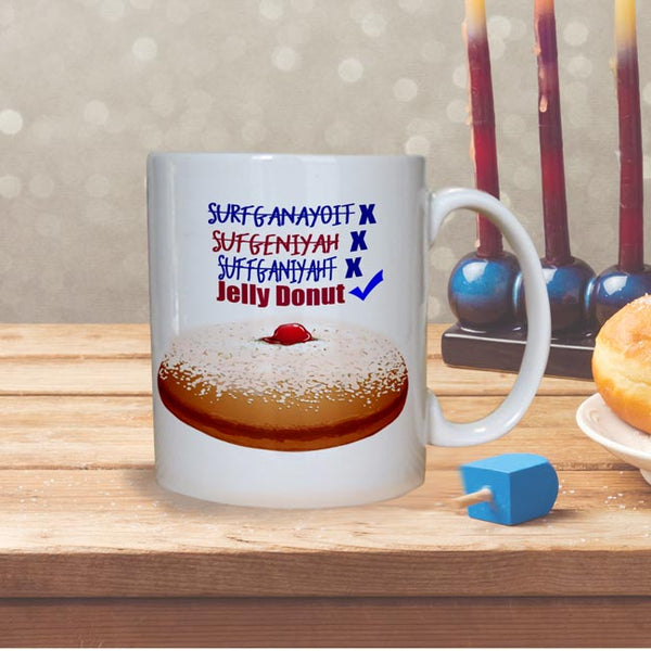 funny Hanukkah Mugs with Multiple wrong spellings for Sufganiyah with x and Jelly Donut with a check mark on ceramic coffee mugs