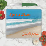 Your favorite beach scene on a cutting board is relaxing when you're cooking