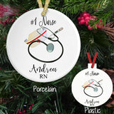 Personalized Ornaments with Nurse Cap, Stethoscope and Thermometer. Personalized on a Porcelain or Plastic Ornament with Text above and below the image. Your Choice of Font and Color of Text.