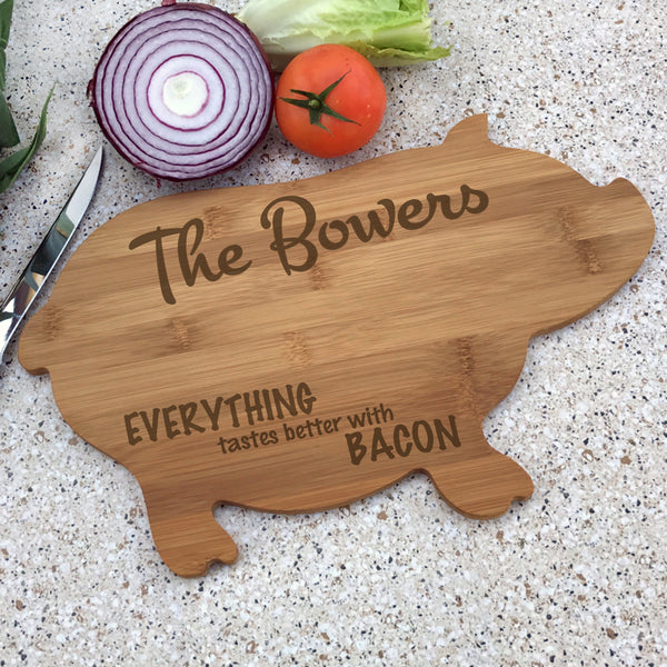 Pig Shaped Cutting Board with personalized engraving on top and bottom leaving center free for cutting, however, chopping and dicing should be done on the non engraved side