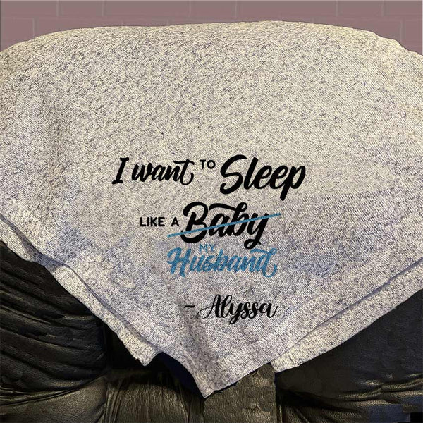 I want to sleep like a baby with baby crossed out and notated to be My Husband instead. Funny Throw Blanket