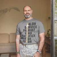 Veteran Valor design shown on a gray tee shirt Veteran in gold and the rest of the text in black