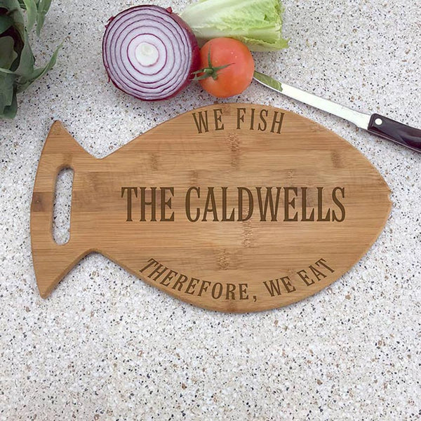Fish shaped bamboo cutting board laser engraved in three areas with your personalized text