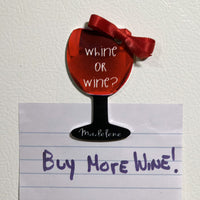 wine glass shaped magnet says whine or wine with a name both text areas can be personalized