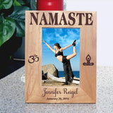 4 x 6 yoga design wood picture frame tall view of Namaste on top Ohm Symbol on left and meditator sitting in lotus position on right. Personalized 2 lines of text on bottom